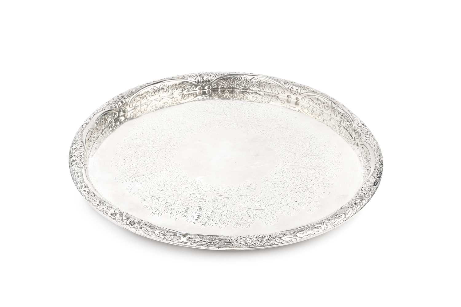 Lot 659 - A late Victorian silver circular tray, the...