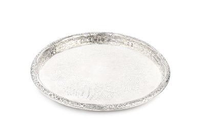 Lot 659 - A late Victorian silver circular tray, the...