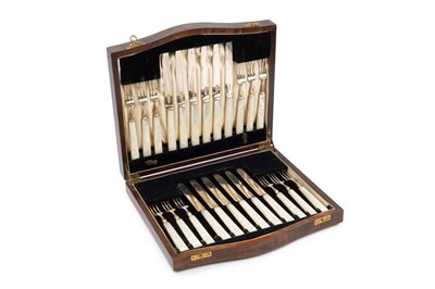 Lot 663 - A set of twelve George V silver dessert knives...