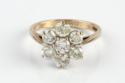 Lot 88 - A diamond cluster ring, the flowerhead cluster...