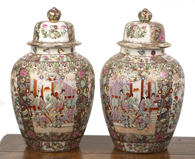 Lot 355 - Pair of Canton-style vases and covers Chinese,...