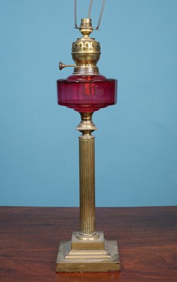 Lot 633 - A Victorian oil lamp later converted for use an an electric table lamp