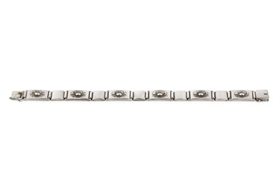 Lot 140 - A silver panel bracelet designed by Henry...