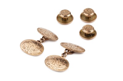 Lot 203 - A pair of 9ct gold cufflinks, the oval panels...