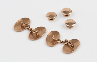 Lot 203 - A pair of 9ct gold cufflinks, the oval panels...
