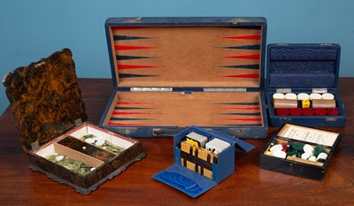 Lot 639 - A 19th century lacquered tabletop games box together with other games