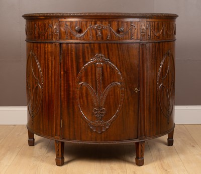 Lot 337 - An Adam style demi-lune mahogany commode by Maple & Co.