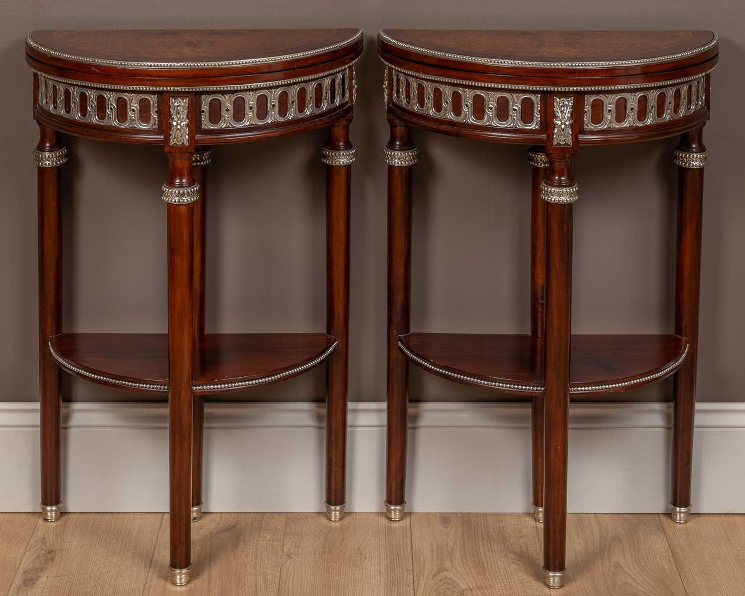 Lot 54 - A pair of 19th century French Empire style demi-lune fold-over side tables