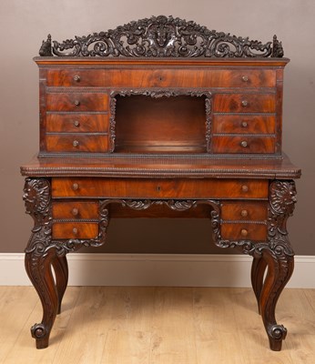 Lot 67 - An Irish style mahogany writing desk with a...