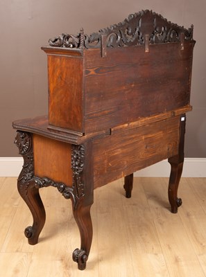 Lot 67 - An Irish style mahogany writing desk with a...