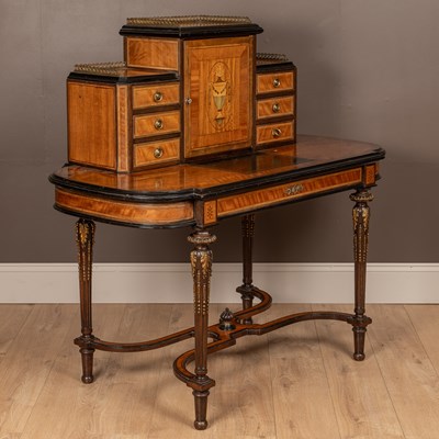 Lot 316 - A late 19th century satinwood ladies writing table