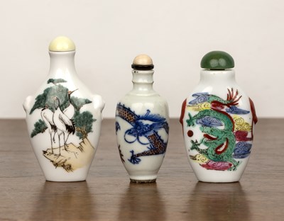 Lot 383 - Three porcelain snuff bottles Chinese,...