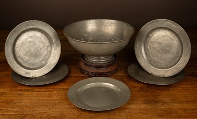 Lot 101 - A group of 18th century and later pewter plates together with a Danish pewter bowl and a Chinese hardwood stand