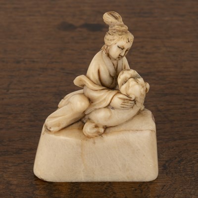 Lot 263 - Small soapstone carving of Guanyin and a kylin...