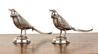 Lot 258 - Pair of white metal model parrots Indian the...