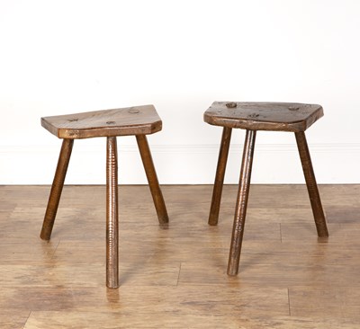 Lot 96 - Two cutlers stools 19th Century, with elm tops,...
