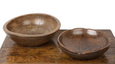 Lot 20 - Two treen bowls the smaller example turned oak,...