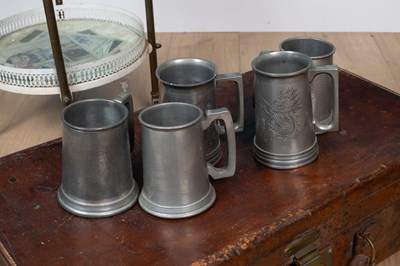 Lot 585 - A suitcase, a drinks trolley, and pewter tankards
