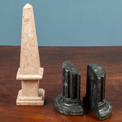 Lot 710 - A pair of bookends and an obelisk ornament