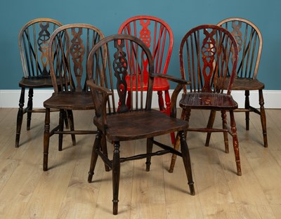 Lot 235 - A group of six wheel-back Windsor kitchen chairs