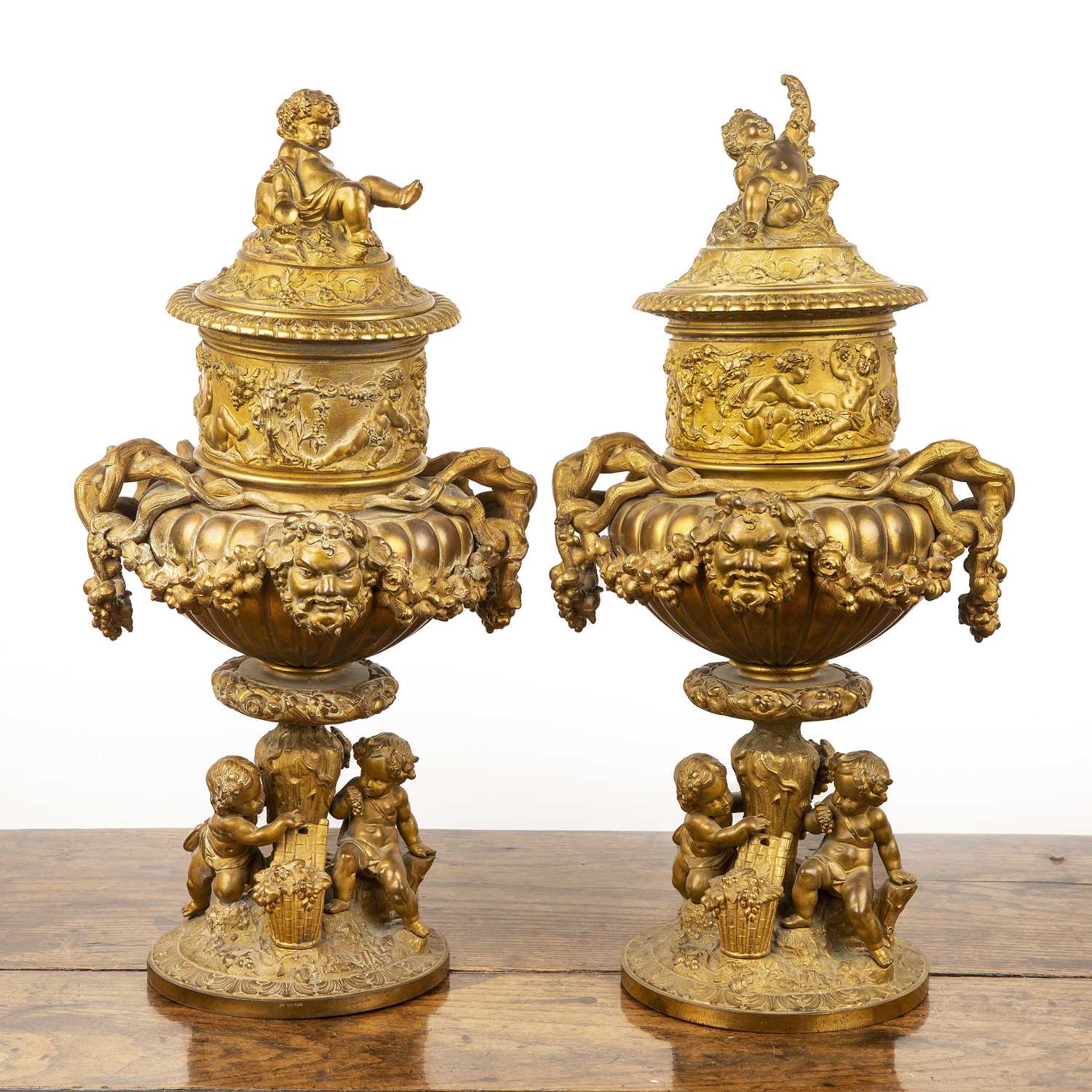 Lot 390 - Pair of French classical gilt bronze wine...