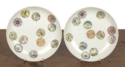 Lot 97 - Pair of enamelled porcelain circular saucer...