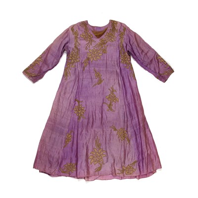 Lot 216 - Purple silk dress with woven decoration and a...