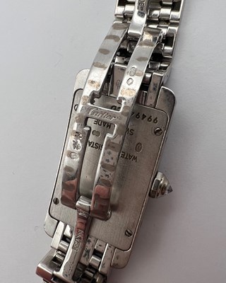 Lot 253 - A lady's 18ct white gold and diamond set 'Tank...