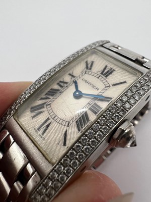 Lot 253 - A lady's 18ct white gold and diamond set 'Tank...