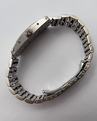 Lot 253 - A lady's 18ct white gold and diamond set 'Tank...