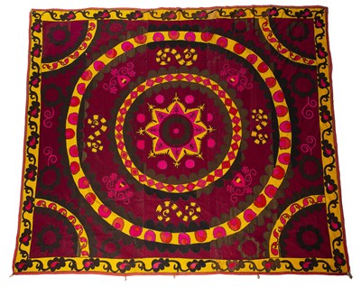 Lot 228 - Crimson ground suzani Uzbekistan, with a...