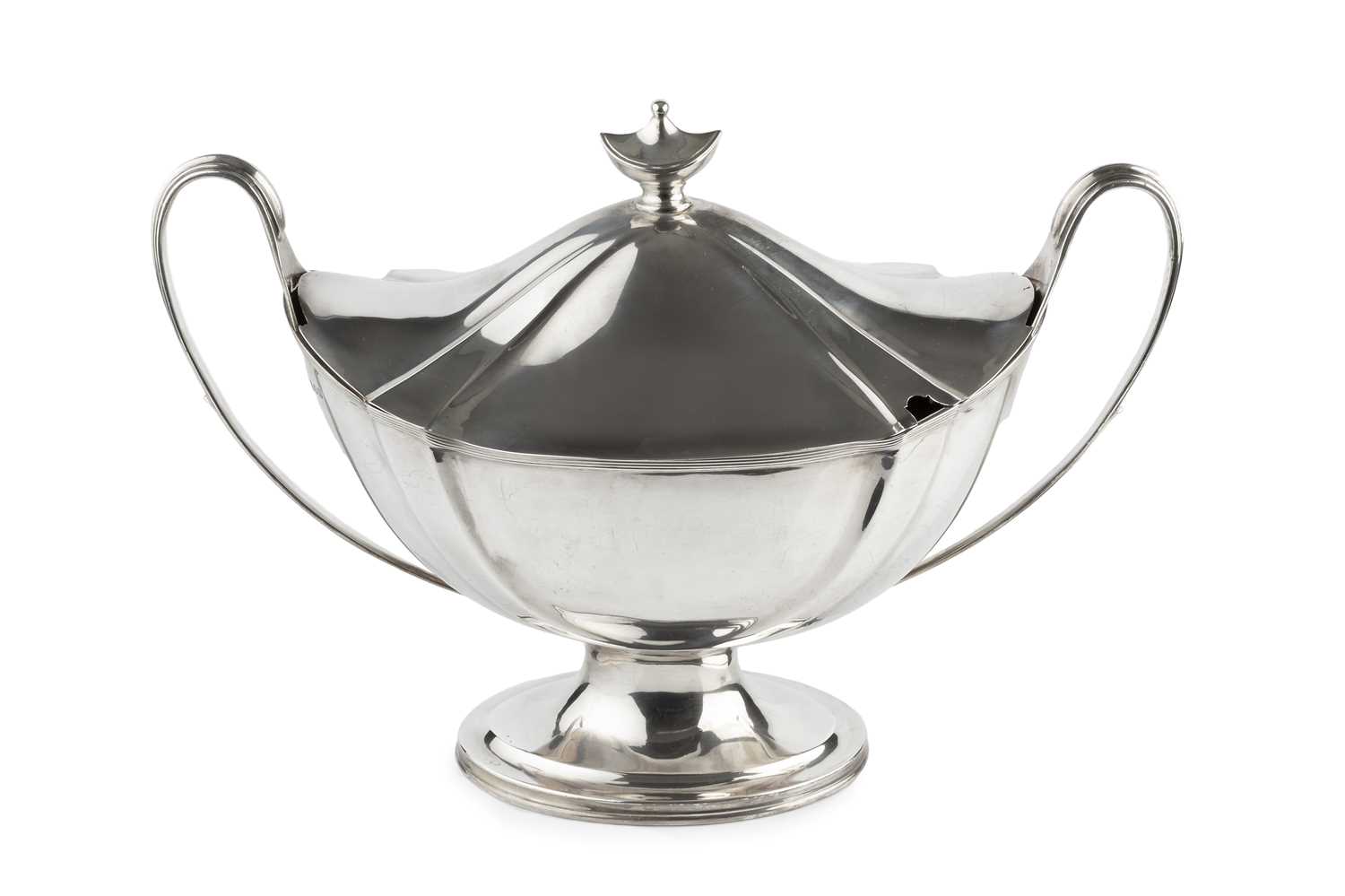 Lot 666 - An Edwardian silver twin handled soup tureen...