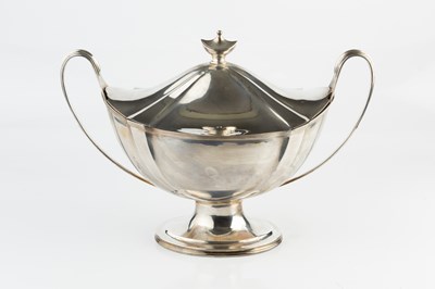 Lot 666 - An Edwardian silver twin handled soup tureen...