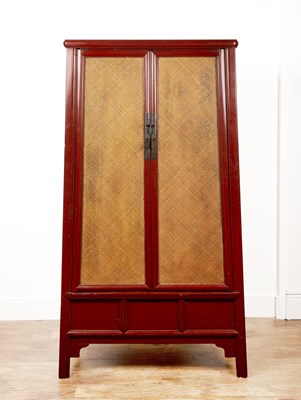 Lot 2 - Red lacquer cabinet  Chinese, with rattan...