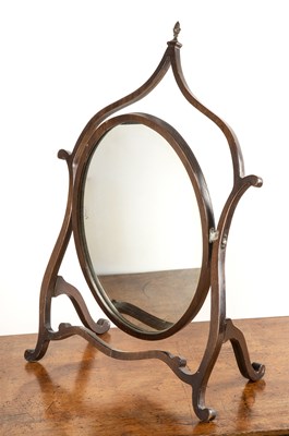 Lot 40 - Mahogany dressing mirror with a shaped frame...