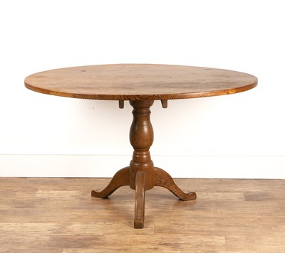 Lot 40 - Pitch pine oval kitchen table with a turned...