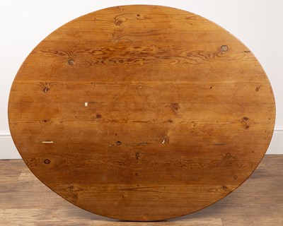 Lot 40 - Pitch pine oval kitchen table with a turned...