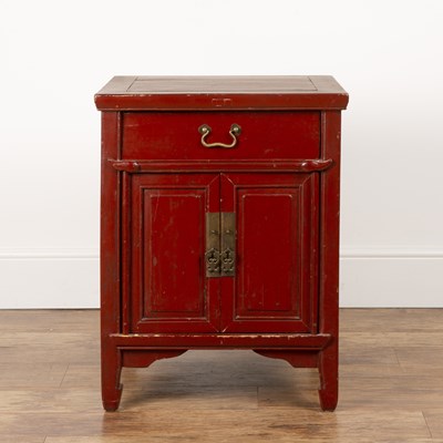 Lot 14 - Red lacquer low cupboard Chinese, fitted with...