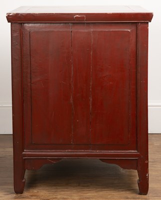 Lot 381 - Red lacquer low cupboard Chinese, fitted with...