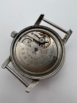 Lot 254 - A 'Conquest' automatic watch head by Longines,...