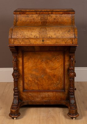 Lot 323 - A 19th century walnut davenport