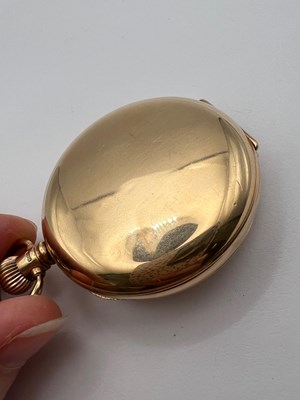 Lot 229 - A 9ct gold hunter pocket watch, the white...
