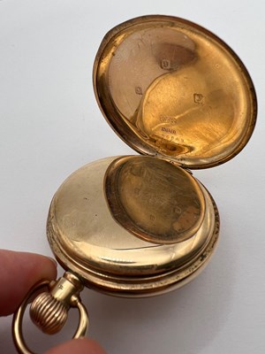 Lot 229 - A 9ct gold hunter pocket watch, the white...
