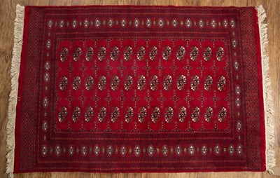 Lot 48 - Red ground rug Afghan/Pakistan with elephant...