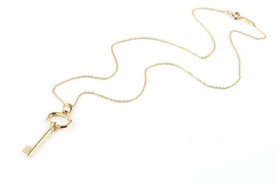 Lot 92 - An 18ct gold 'Keys' pendant on chain by...