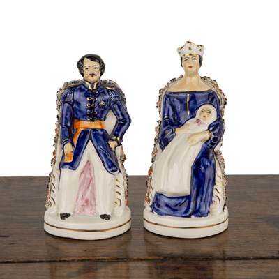 Lot 249 - Pair of Staffordshire figures depicting Queen...