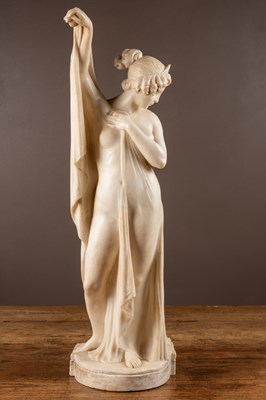 Lot 311 - An alabaster sculpture of a draped nude