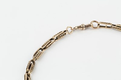Lot 6 - A fancy-link Albert chain, with star decorated...