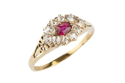 Lot 124 - A ruby and diamond cluster ring, the...