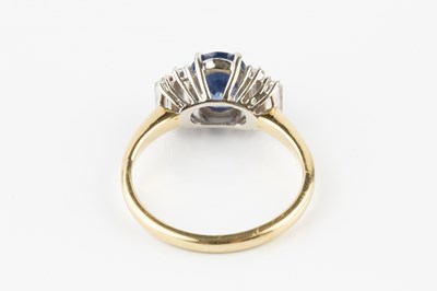 Lot 73 - A sapphire and diamond dress ring, the oval...